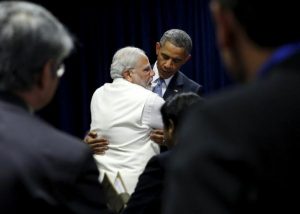 U.S. President Obama and India's Prime Minister Modi embrace at the end of their meeting at the  United Nations General Assembly in New York