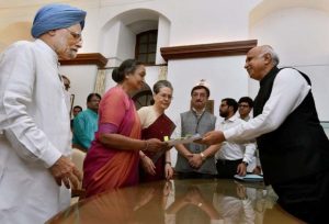 New Delhi: Opposition presidential candidate Meira Kumar filing her nomination papers in the presence of former Prime Minister Manmohan Singh and Congress President Sonia Gandhi at Parliament House, in New Delhi on Wednesday. PTI Photo by Atul Yadav(PTI6_28_2017_000018B)